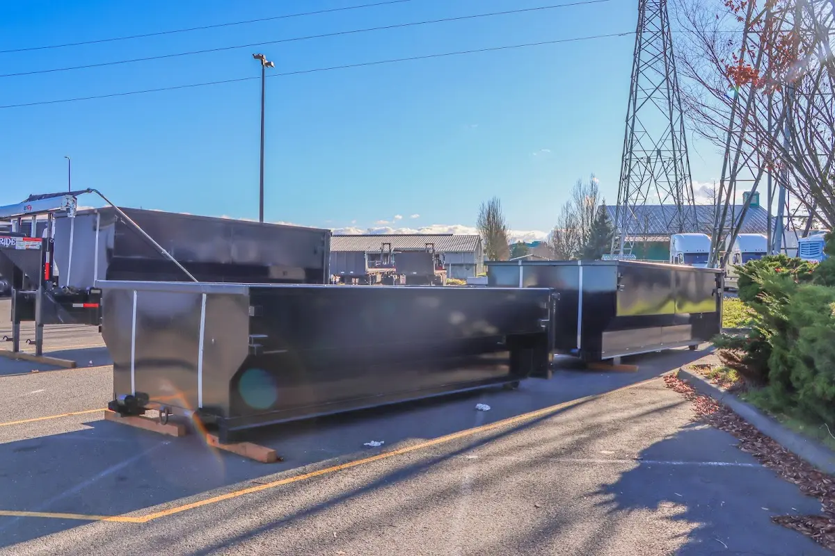 Roll-off dumpster ready for waste disposal at job site for 4 Yard Dumpster Rental in Fairview